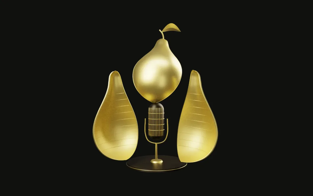 Gold pear sculpture opened into three shells around a microphone on a dark plinth
